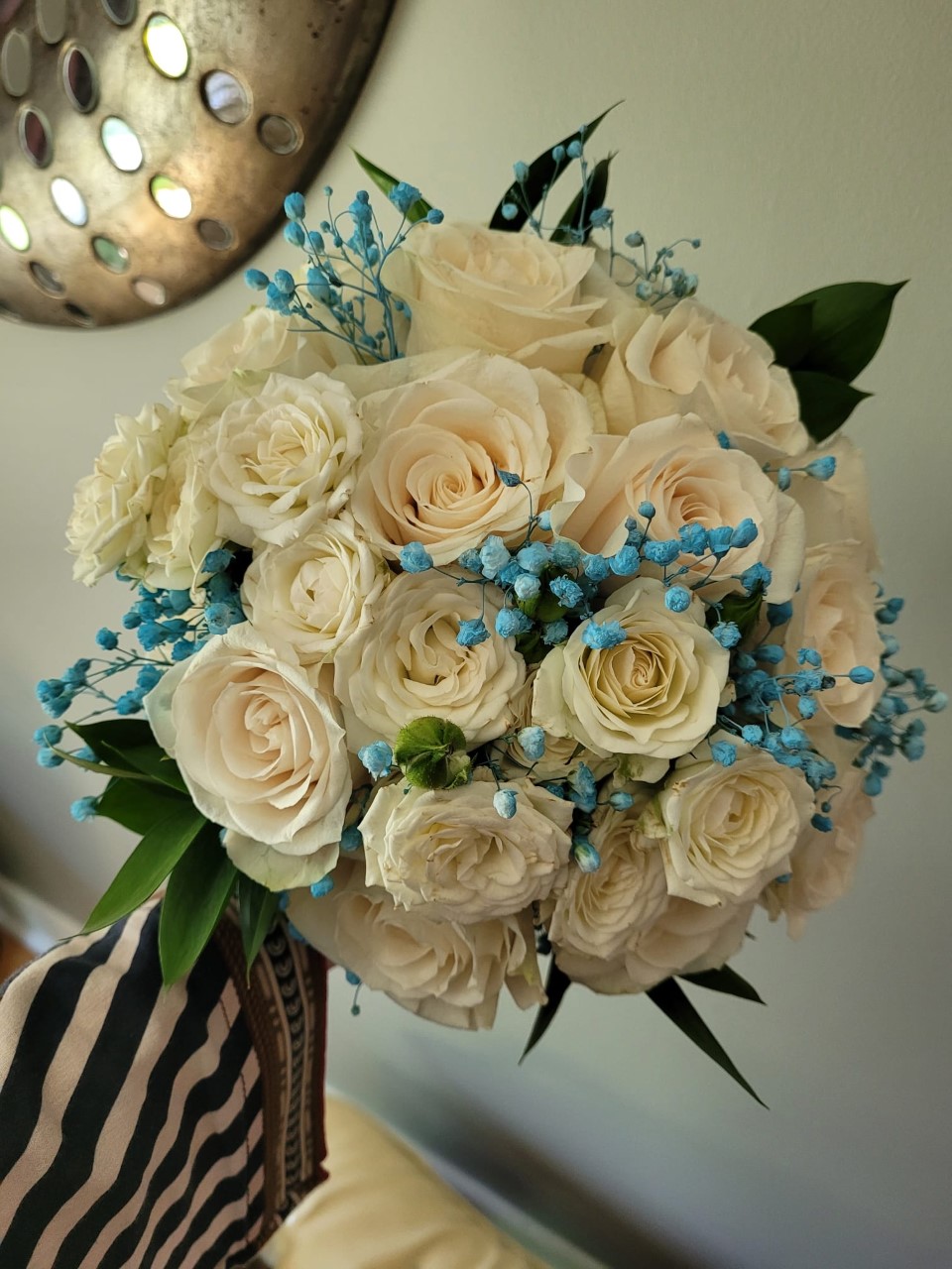 $135  Roses and sprayed babies breath bridal bouquet                                                                  