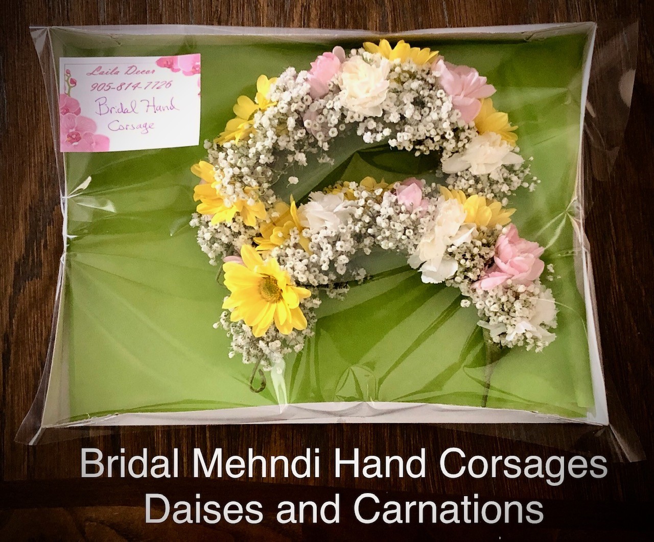 $25  each Bridal hand corsage daisies and carnations                  