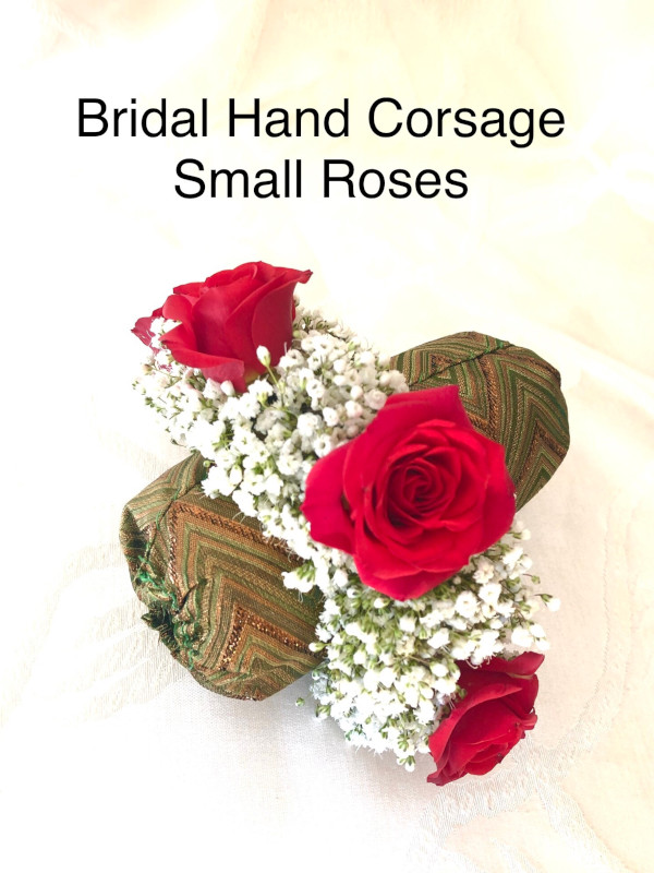 $30   each Bridal Hand Corsage Small Roses                                 