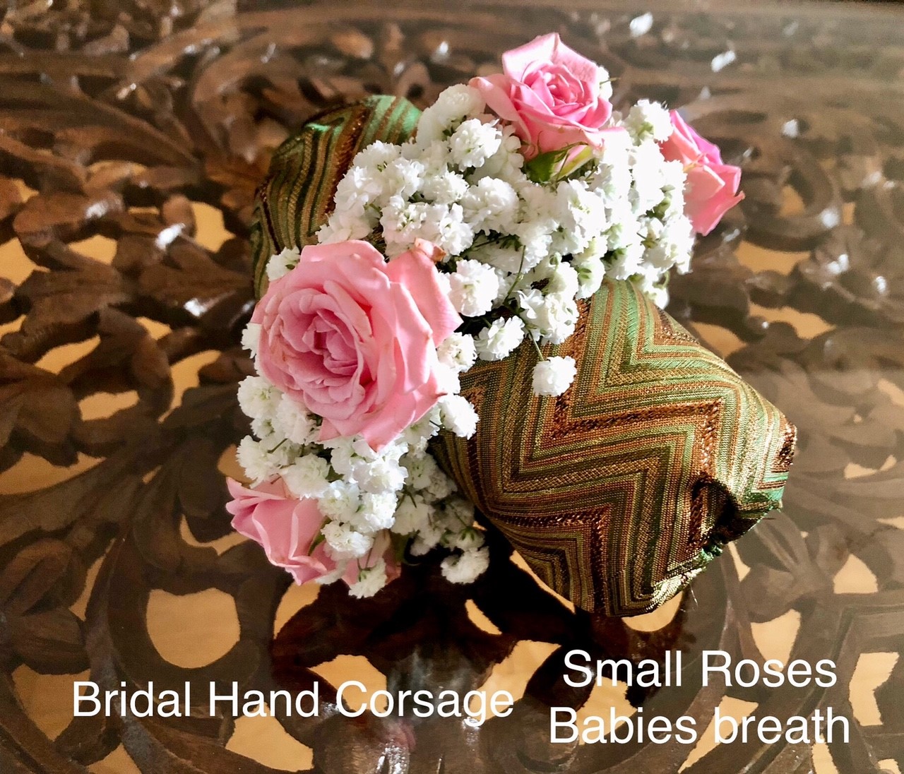 $30  each Bridal hand corsage small roses                              