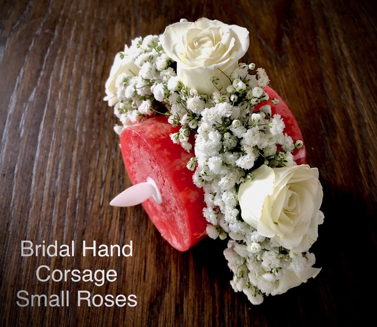 $30 each Bridal hand corsage small roses                           