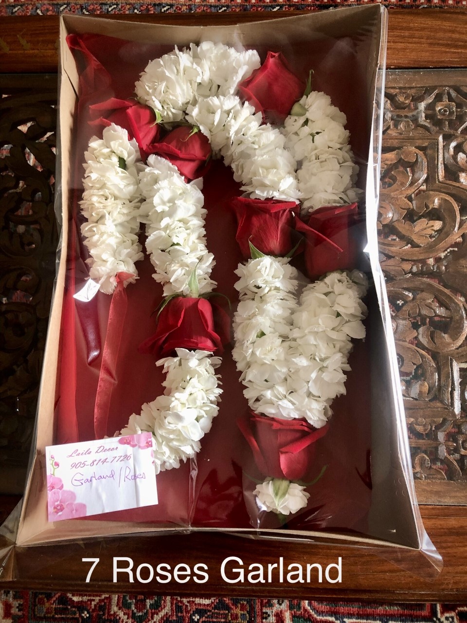 7 Roses garland in box $97.50 