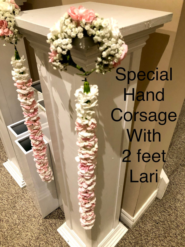Special Hand Corsage with 2 feet lari $65        